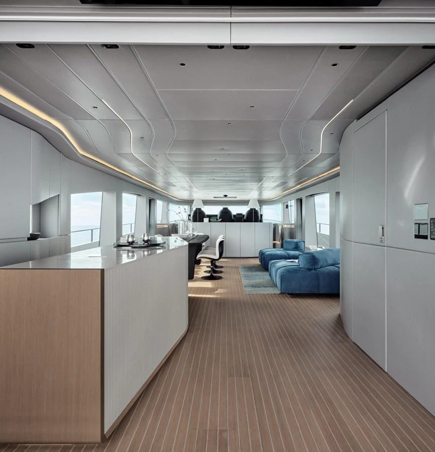The yacht's salon features a sleek, modern design with ample seating and natural light. aboard 50 SHADES OF PLAY Yacht for Sale