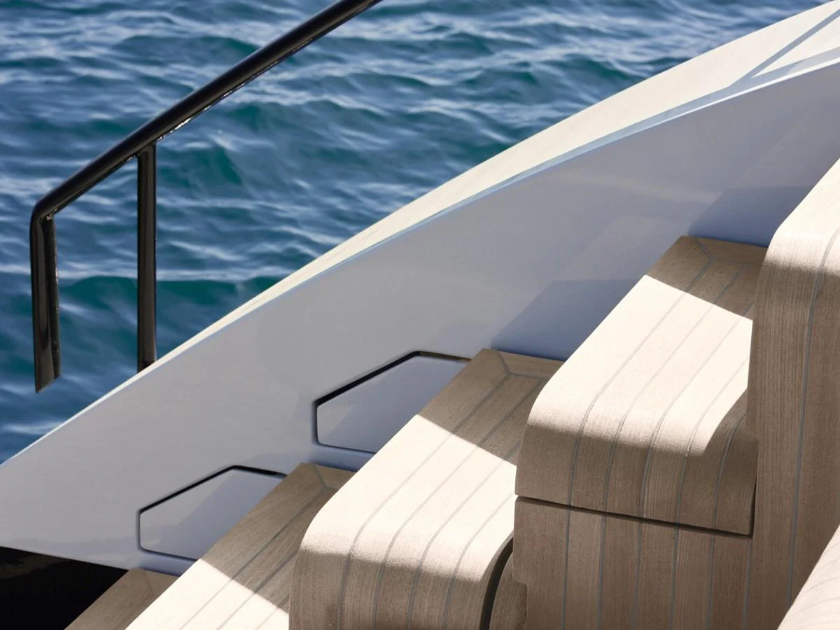 A close-up view of the yacht's elegant steps leading down to the water. aboard 50 SHADES OF PLAY Yacht for Sale