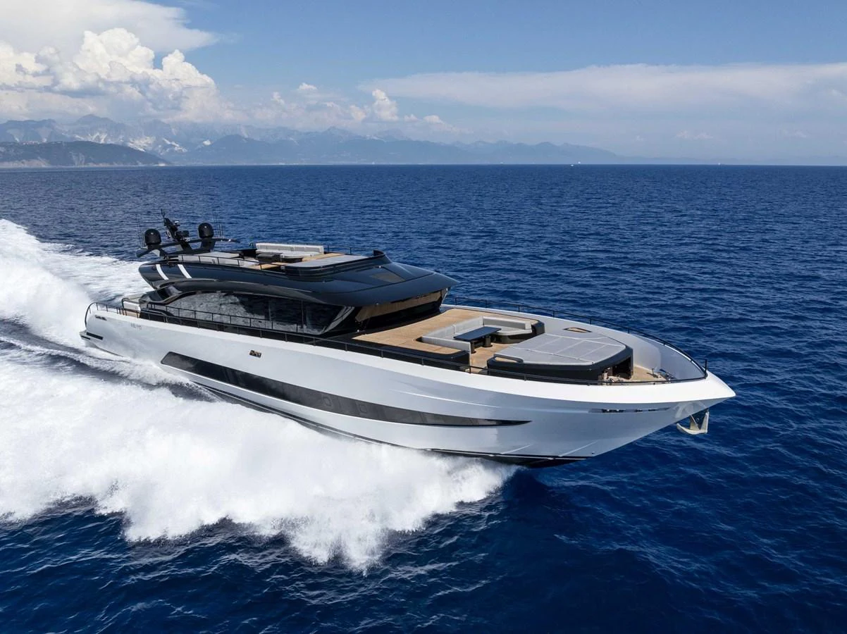A sleek and modern yacht glides swiftly across the open sea, showcasing its elegant design and luxurious amenities. aboard 50 SHADES OF PLAY Yacht for Sale