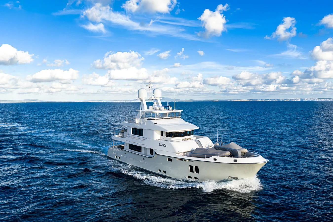 a white yacht in the water aboard VIVIERAE II Yacht for Sale