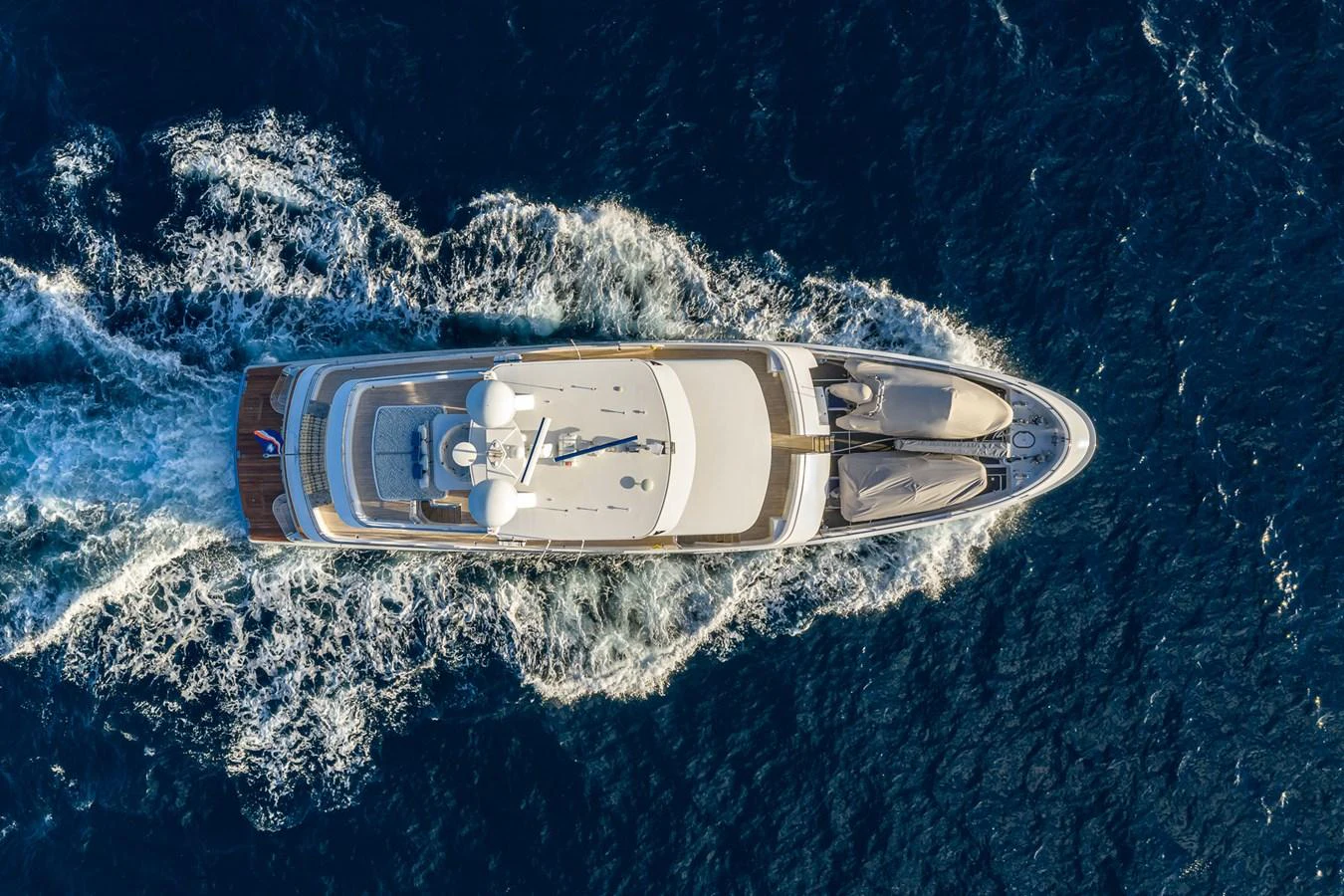 a car on a snowy mountain aboard VIVIERAE II Yacht for Sale