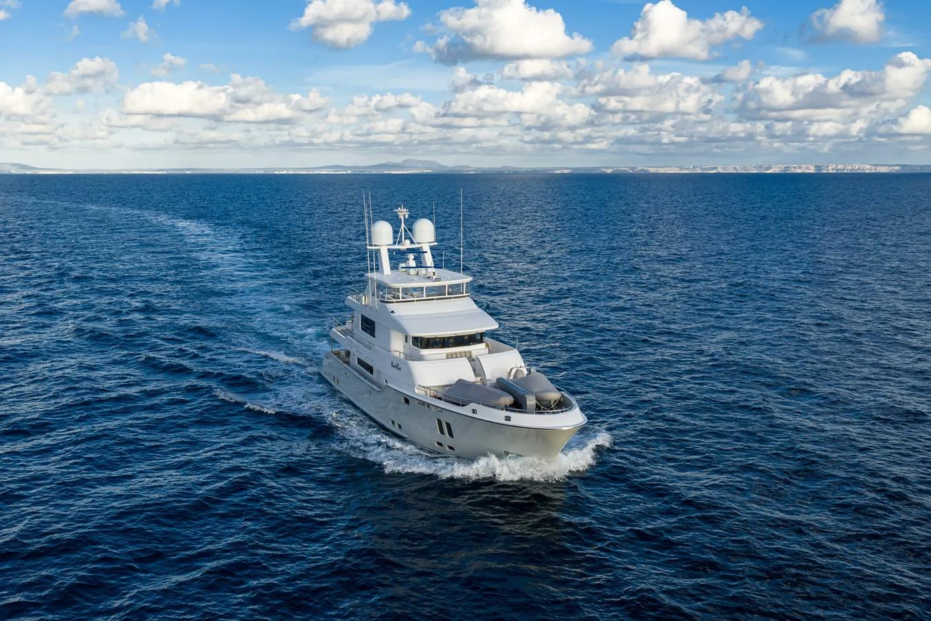 a white boat in the water aboard VIVIERAE II Yacht for Sale