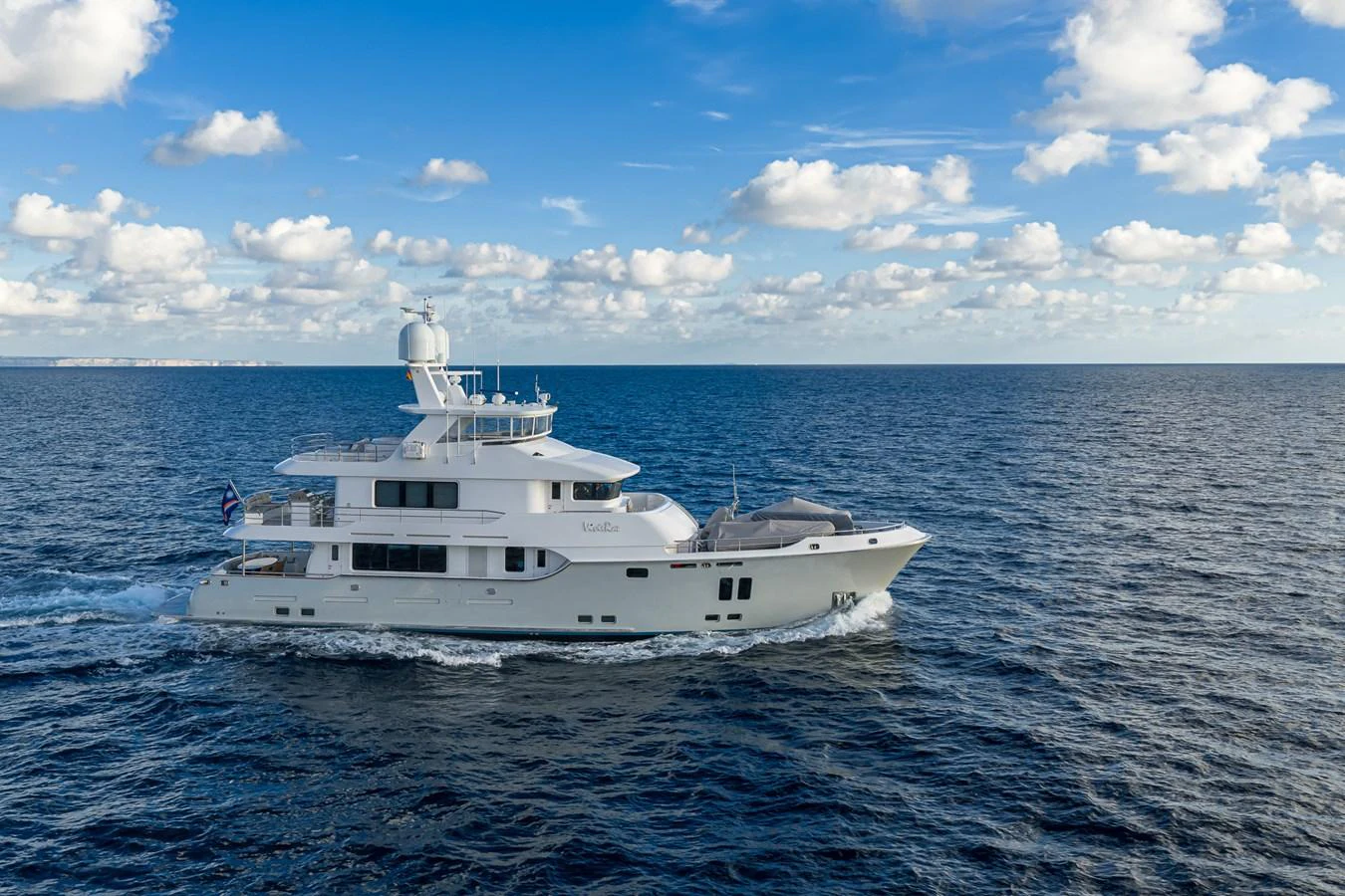 a white yacht in the water aboard VIVIERAE II Yacht for Sale