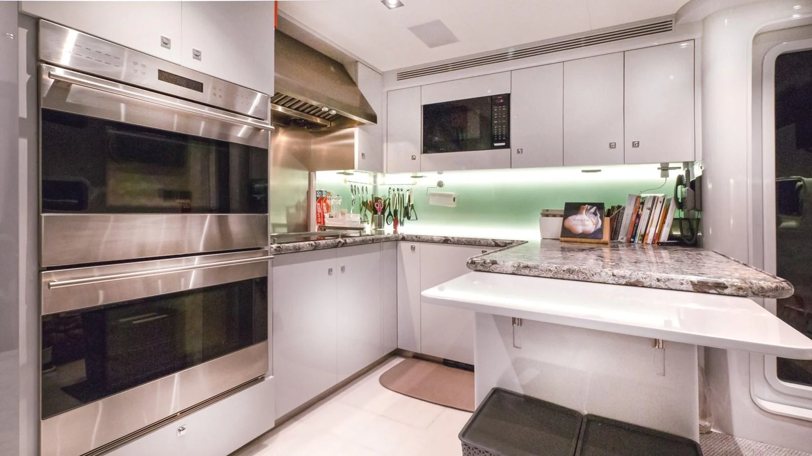 a kitchen with a large oven aboard VIVIERAE II Yacht for Sale