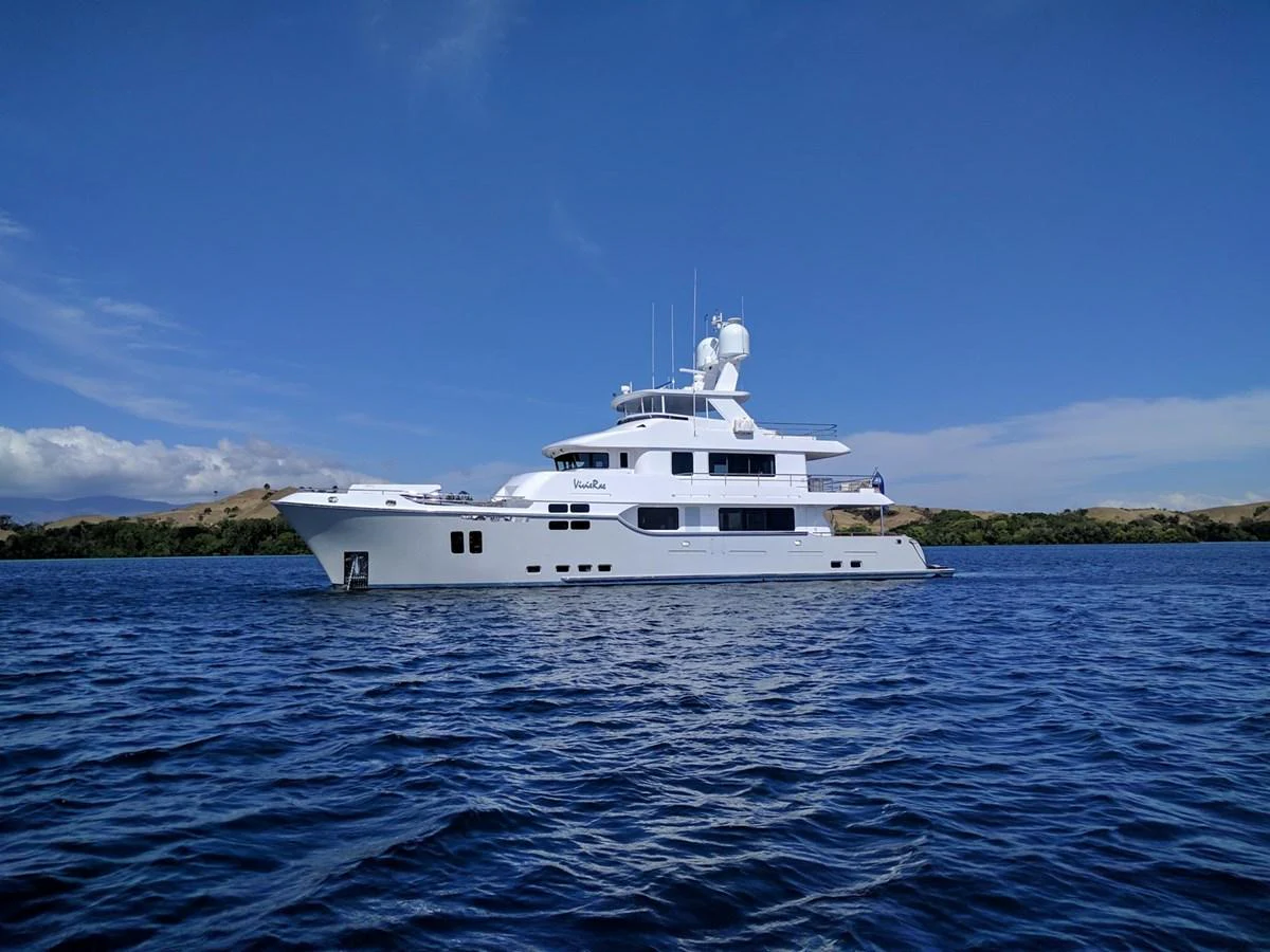 a white boat in the water aboard VIVIERAE II Yacht for Sale