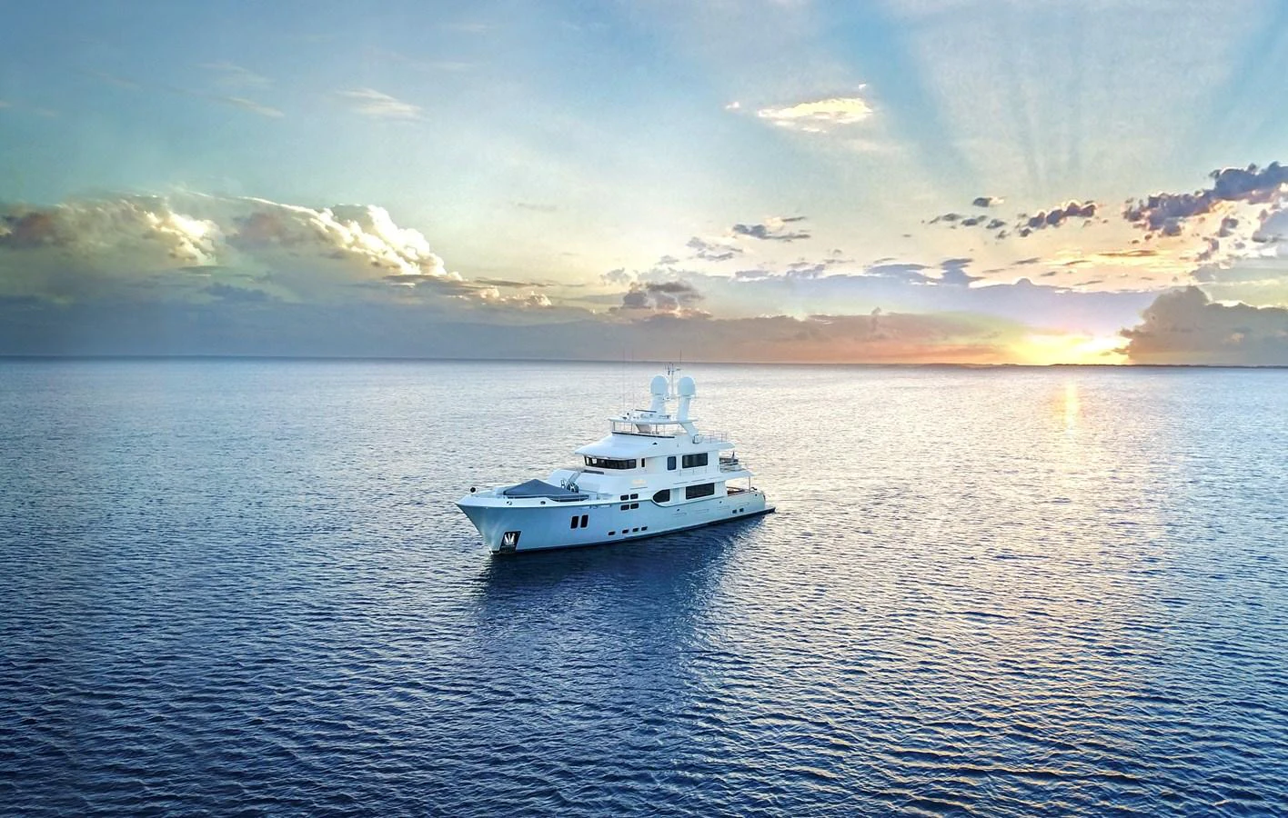 a white boat in the water aboard VIVIERAE II Yacht for Sale