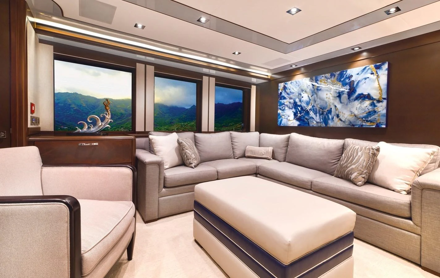 a living room with a couch and a tv aboard VIVIERAE II Yacht for Sale