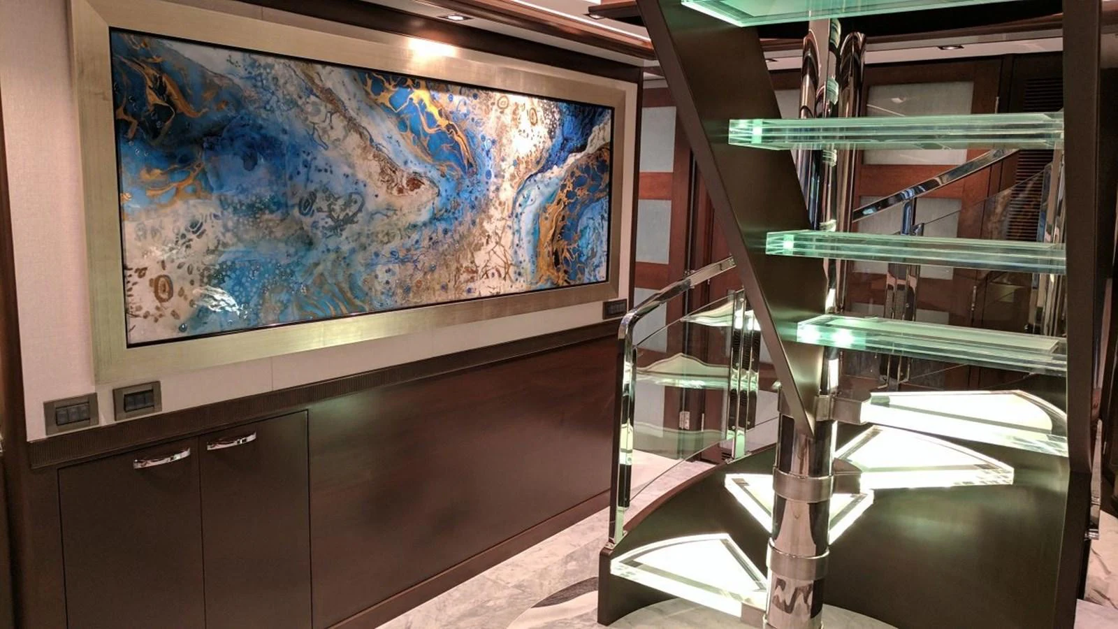 a room with a painting on the wall aboard VIVIERAE II Yacht for Sale