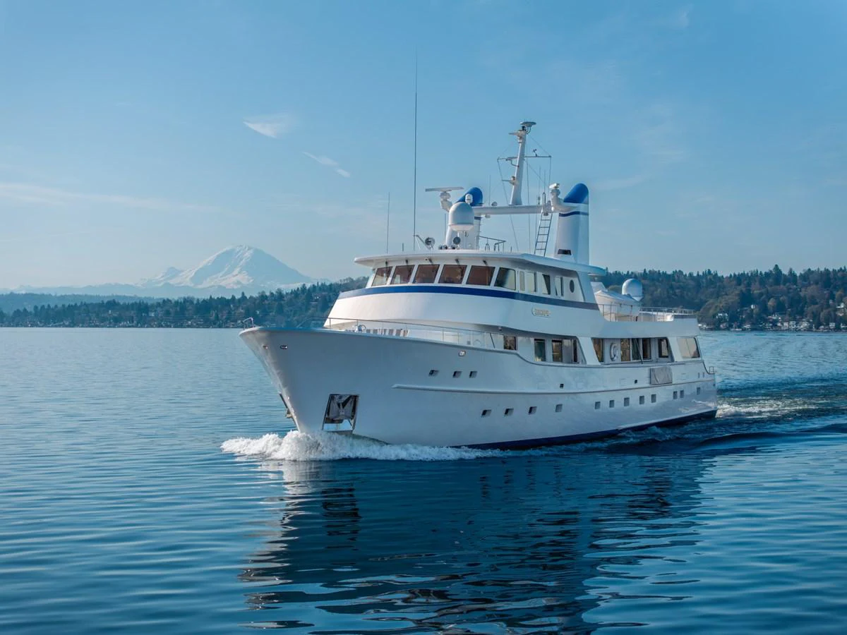 a white boat on the water aboard ESCAPE OF LONDON Yacht for Sale