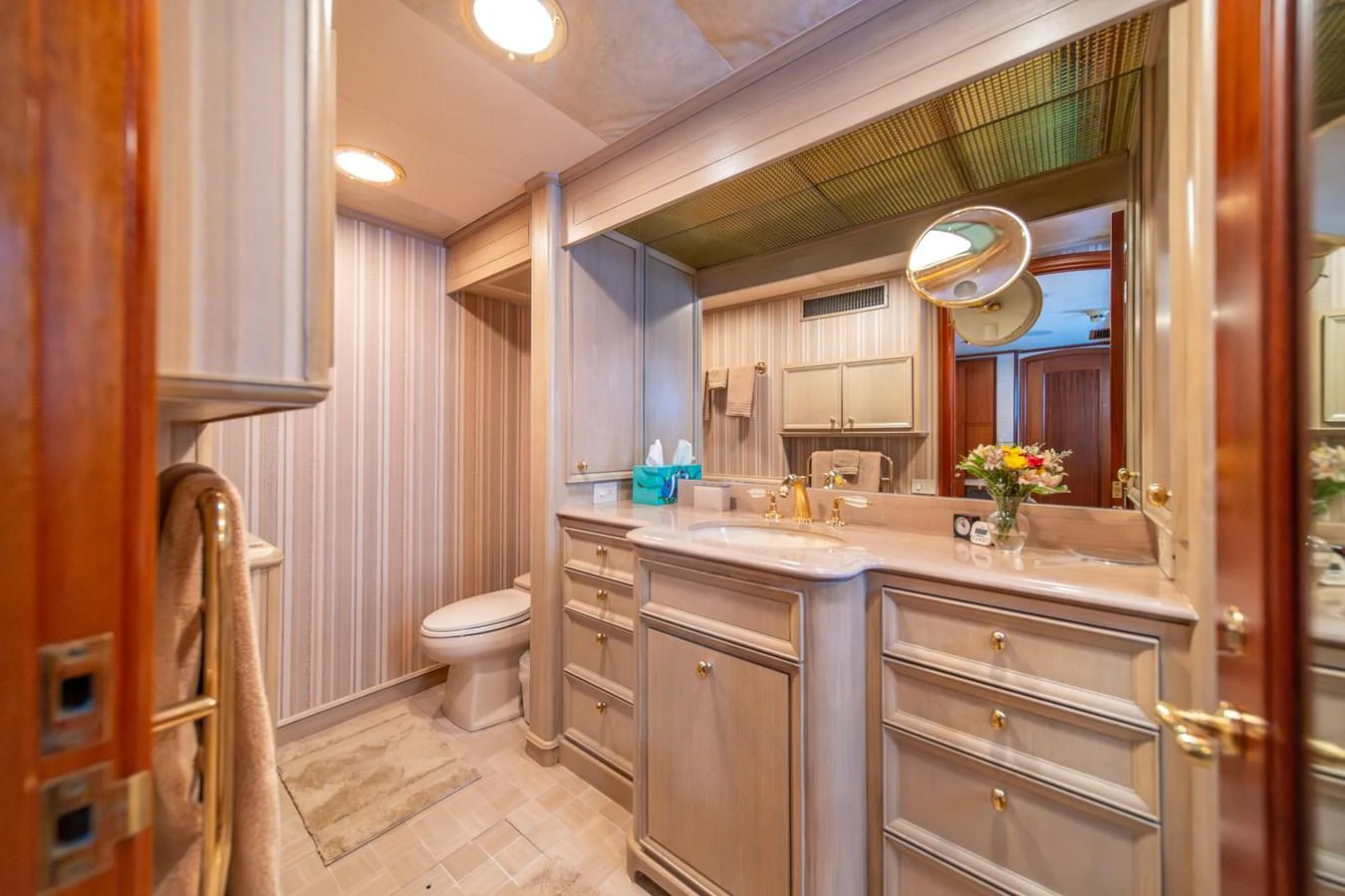 a bathroom with a sink and a toilet aboard ESCAPE OF LONDON Yacht for Sale