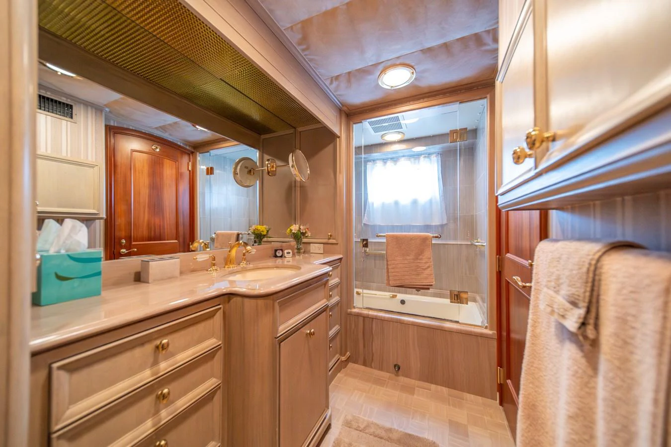 a bathroom with a sink and a mirror aboard ESCAPE OF LONDON Yacht for Sale