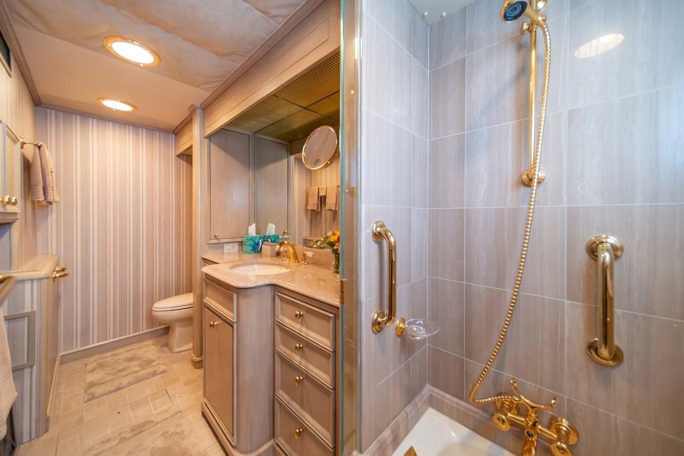 a bathroom with a sink and a shower aboard ESCAPE OF LONDON Yacht for Sale