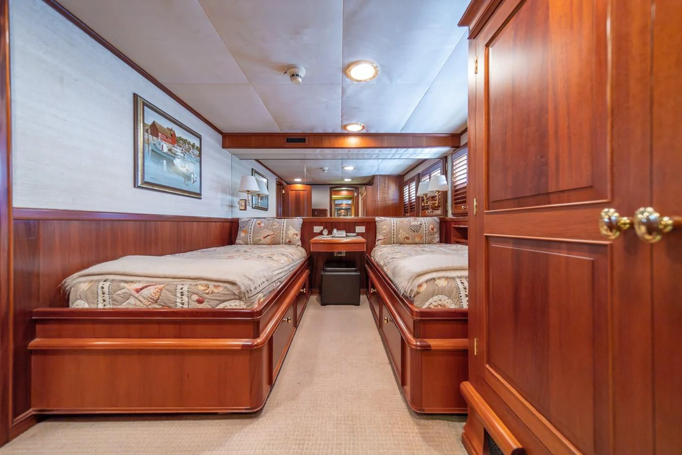 a room with a bed and a desk aboard ESCAPE OF LONDON Yacht for Sale