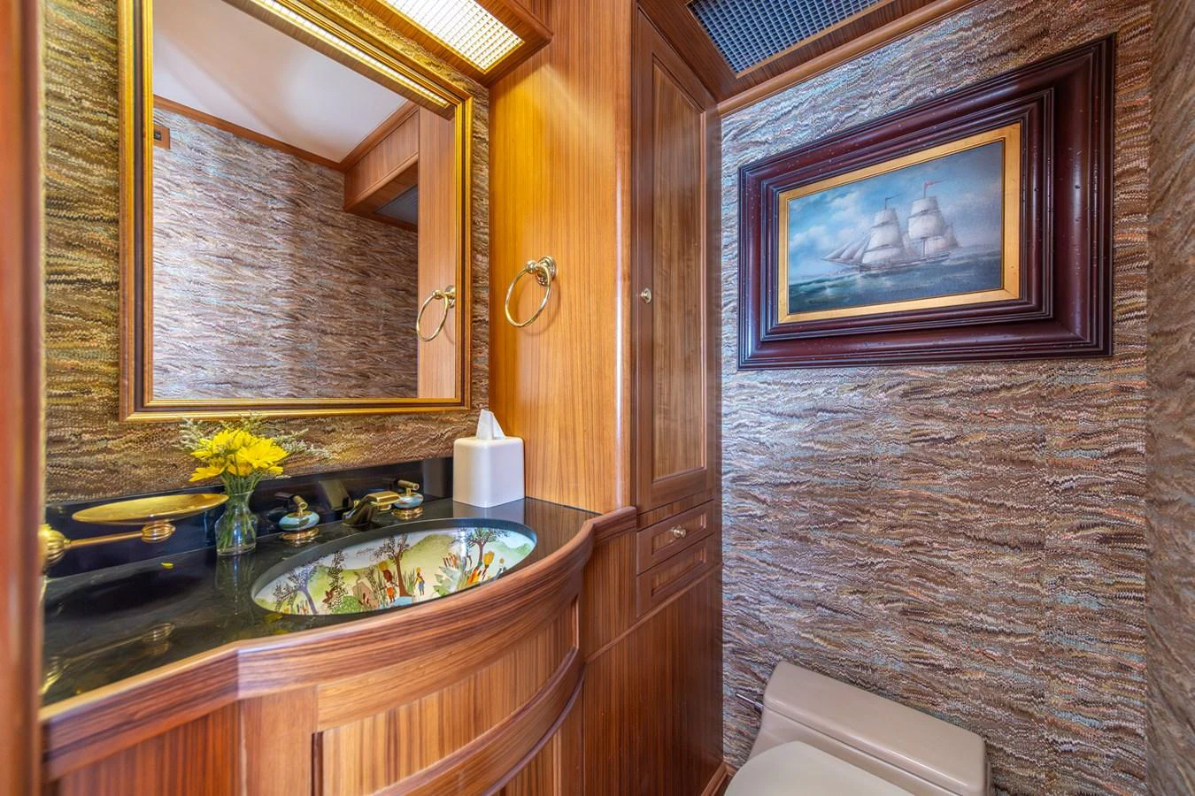 a bathroom with a sink and a mirror aboard ESCAPE OF LONDON Yacht for Sale