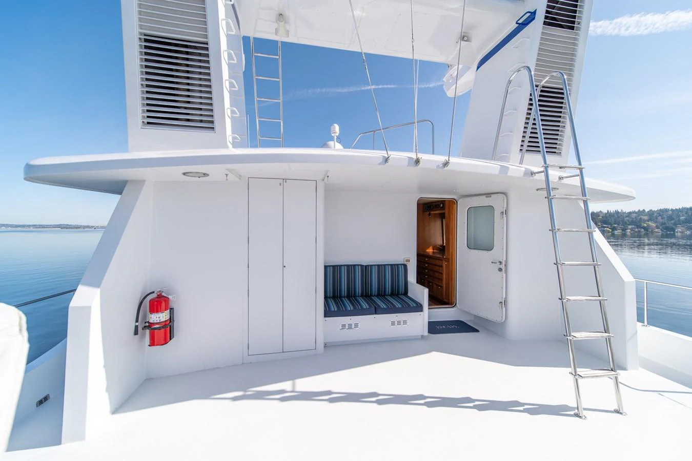 a white boat with a deck aboard ESCAPE OF LONDON Yacht for Sale