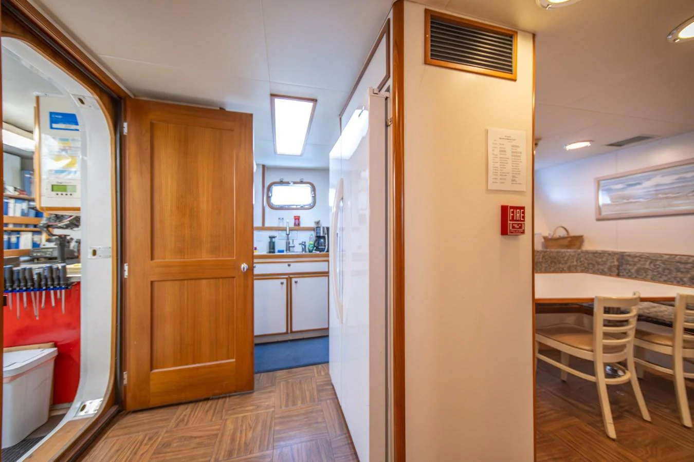 a room with a wood door and a wood door aboard ESCAPE OF LONDON Yacht for Sale
