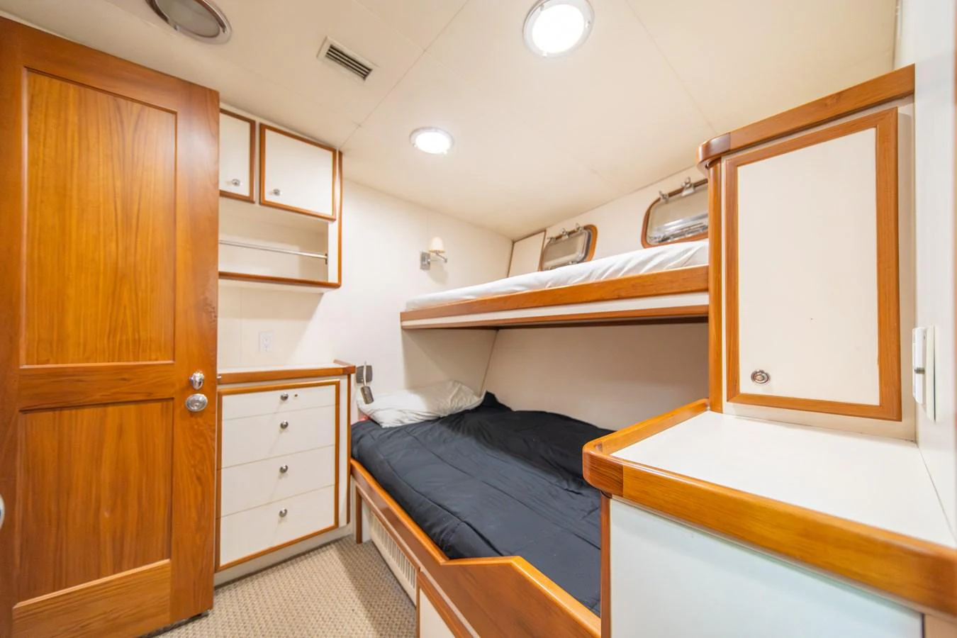 a room with two beds aboard ESCAPE OF LONDON Yacht for Sale