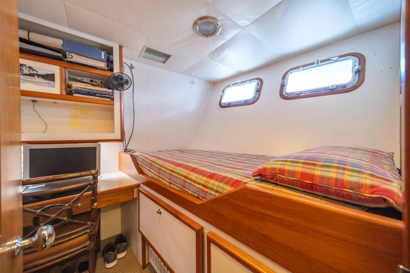 a bedroom with a bunk bed aboard ESCAPE OF LONDON Yacht for Sale