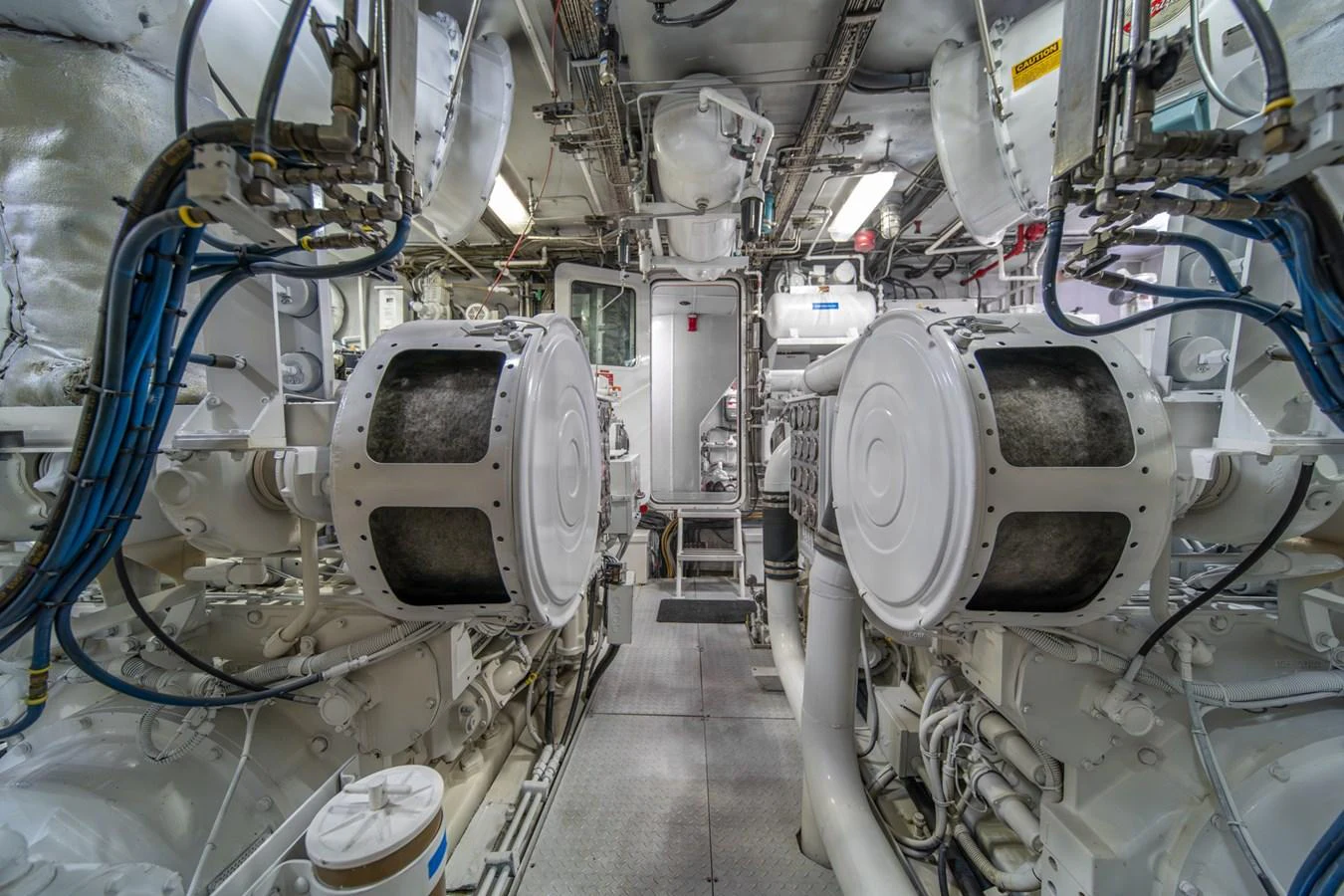 a large white machine with many pipes aboard ESCAPE OF LONDON Yacht for Sale