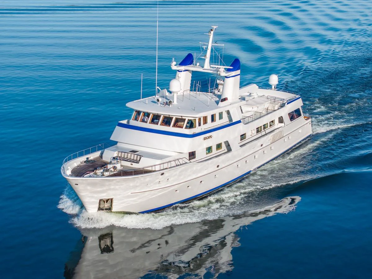 a large white boat in the water aboard ESCAPE OF LONDON Yacht for Sale