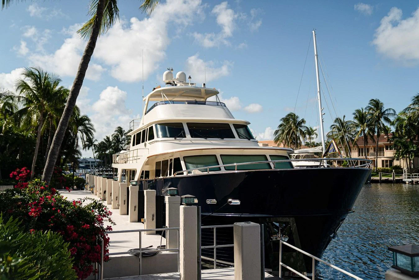 a boat docked at a pier aboard TOP TIMES Yacht for Sale