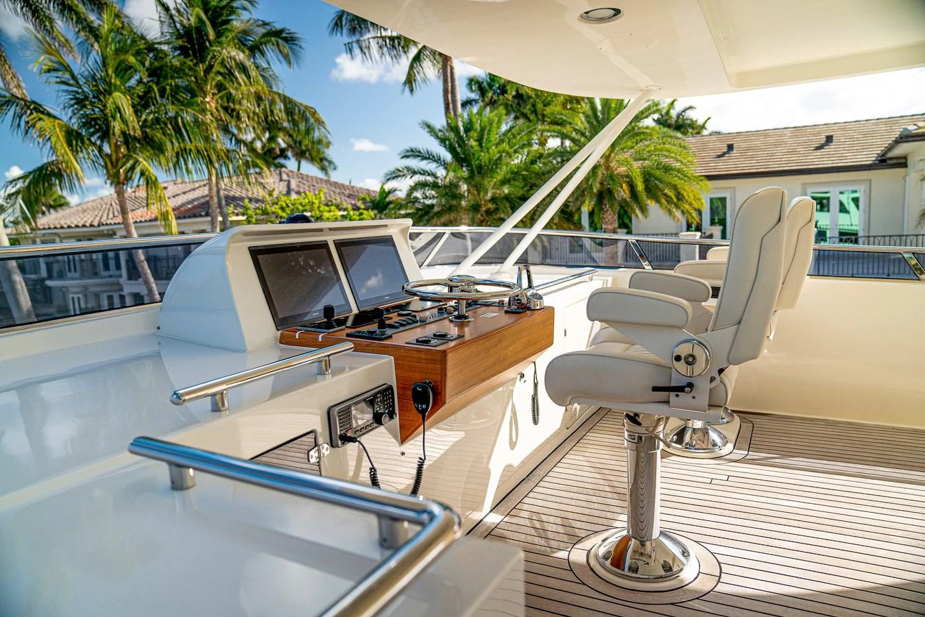 a deck with a pool table and chairs aboard TOP TIMES Yacht for Sale