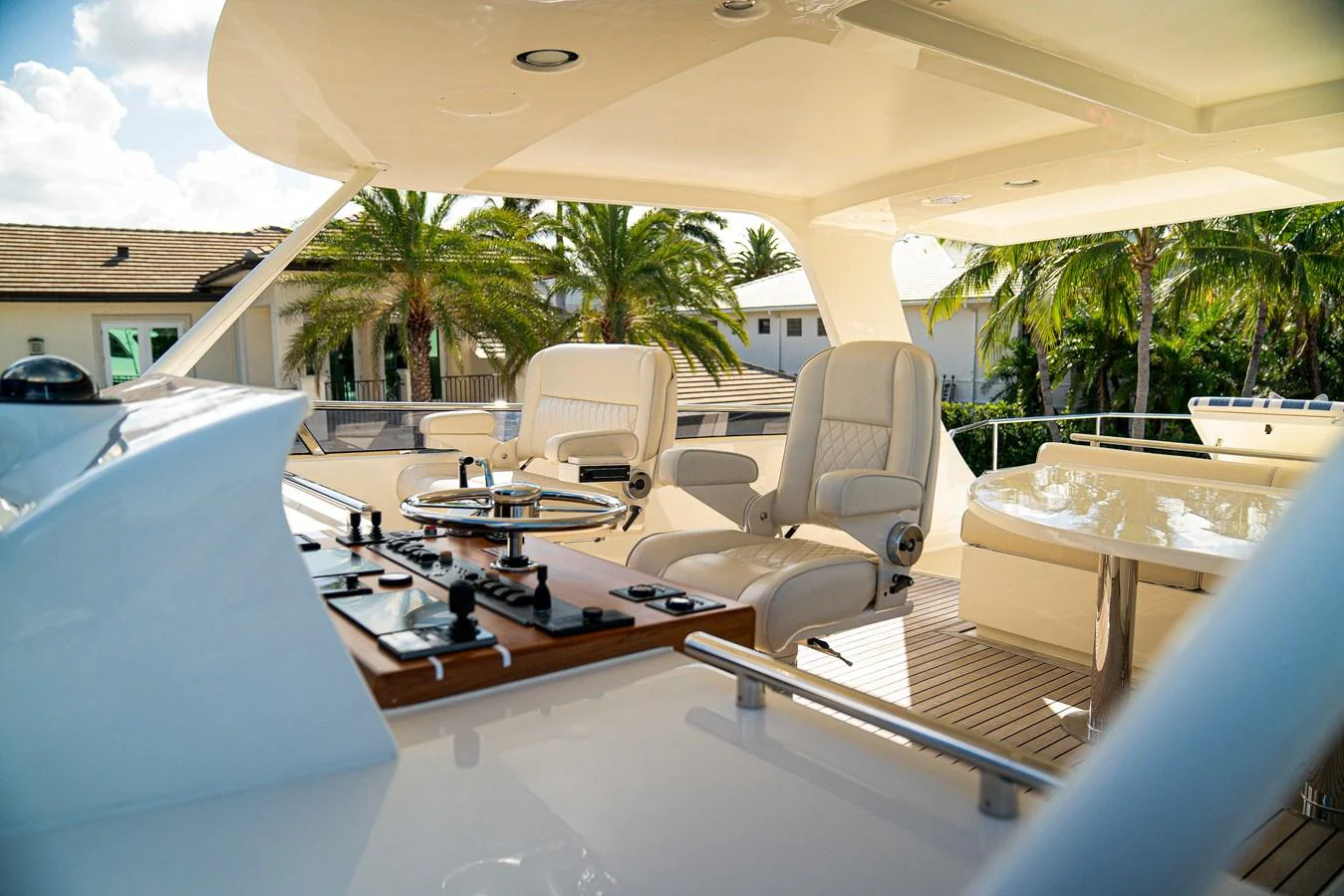 a large lounge area with a table and chairs aboard TOP TIMES Yacht for Sale