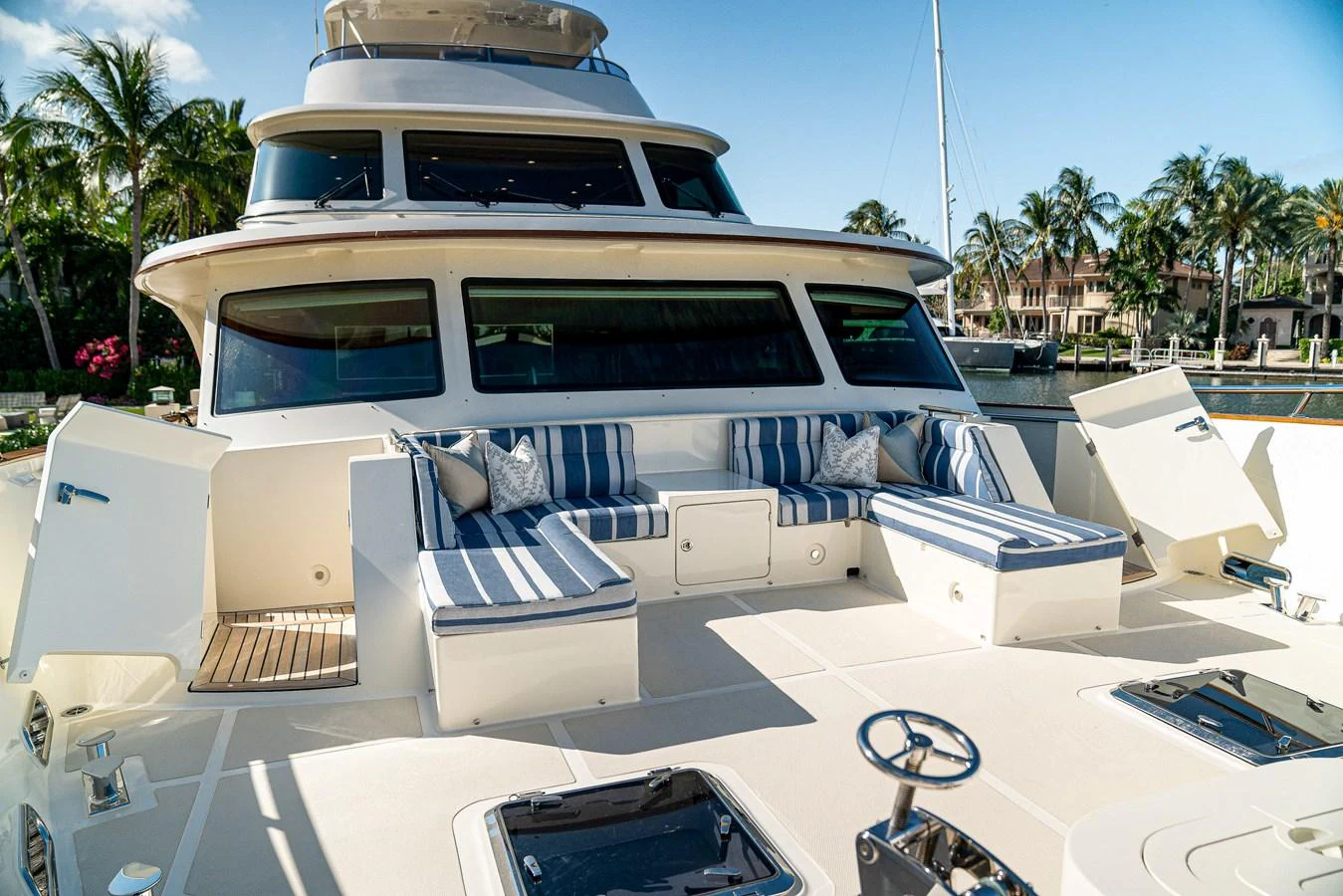 a white car parked on a road aboard TOP TIMES Yacht for Sale