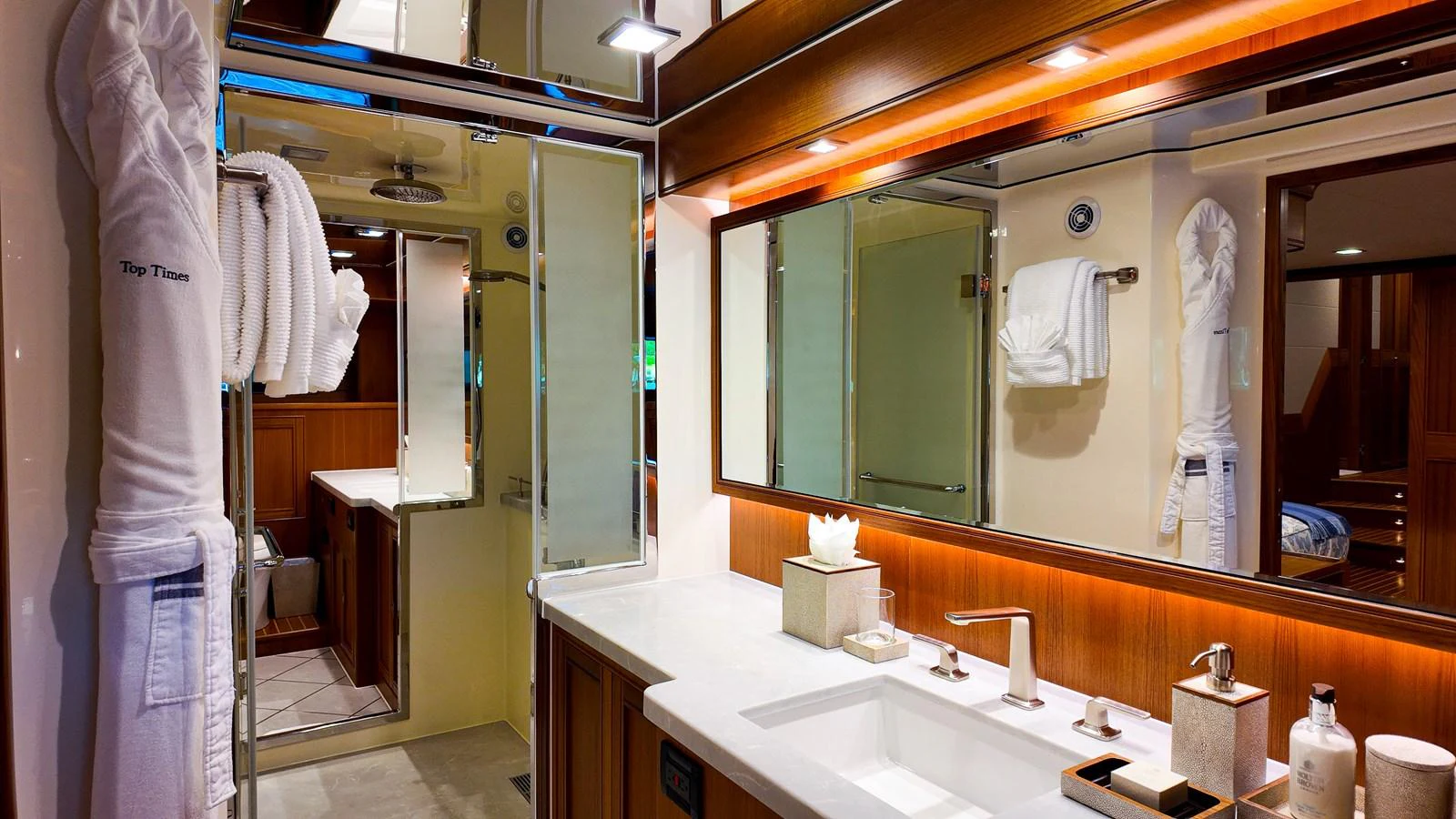 a bathroom with a large mirror aboard TOP TIMES Yacht for Sale