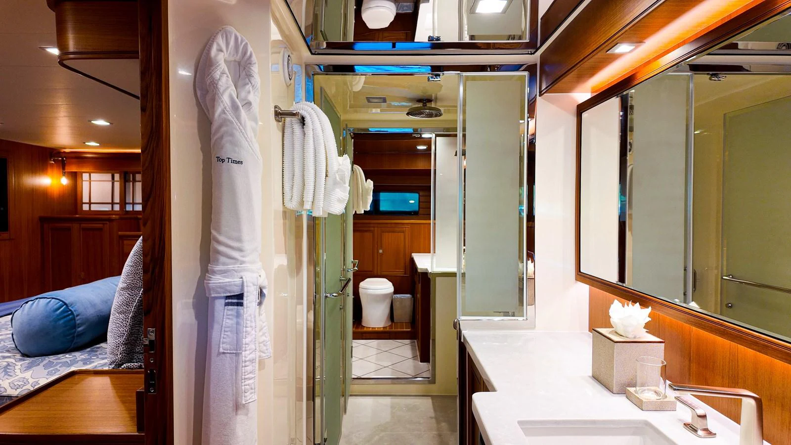 a room with a bed and a closet aboard TOP TIMES Yacht for Sale