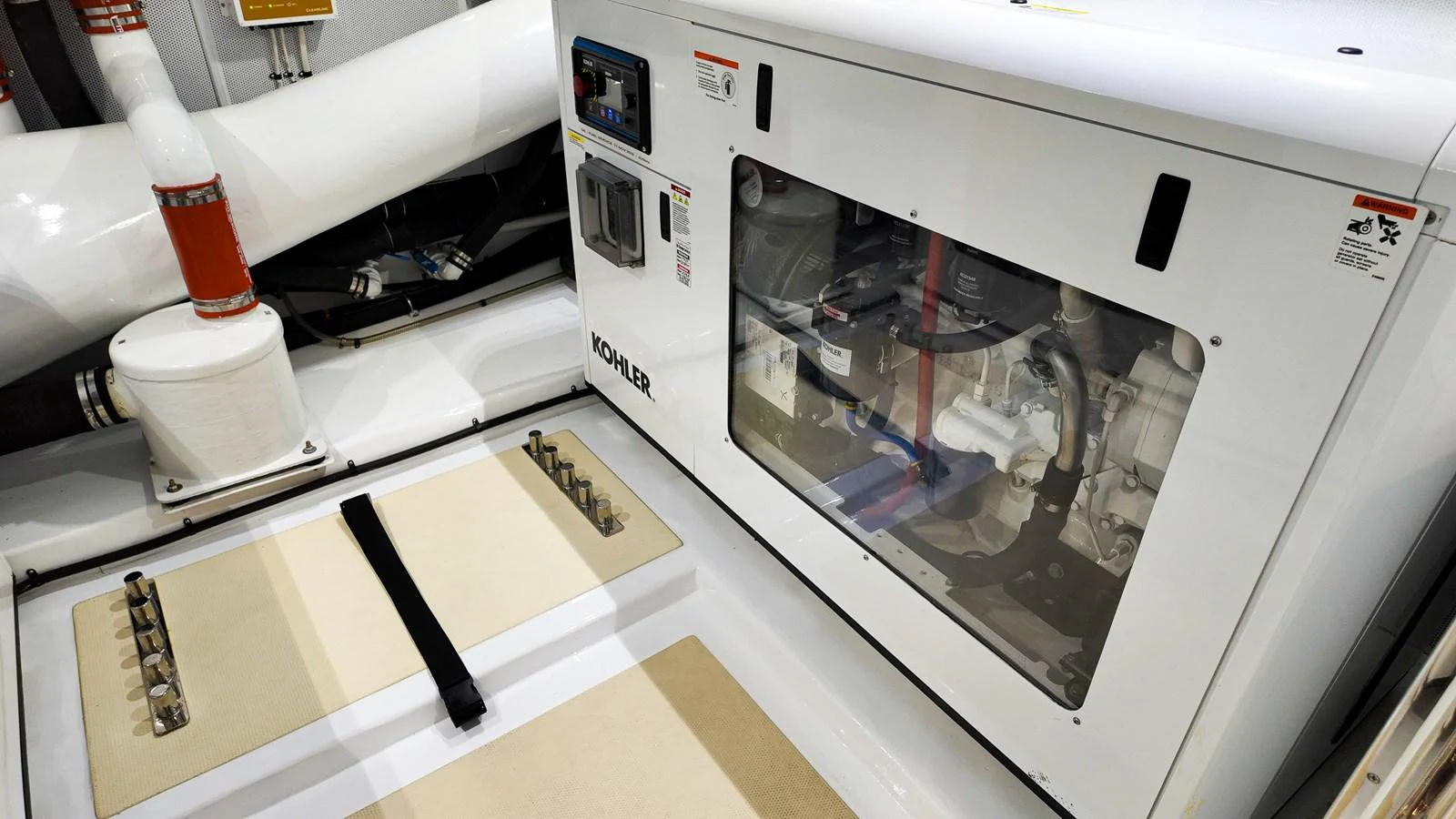 a machine with a red and white label aboard TOP TIMES Yacht for Sale