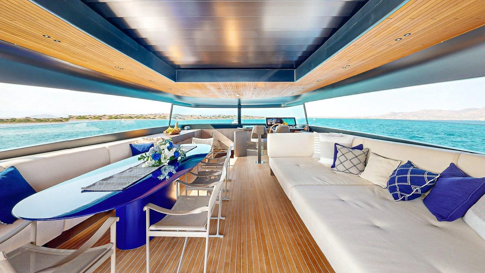 a large pool with a deck aboard JUST MARIE III Yacht for Sale