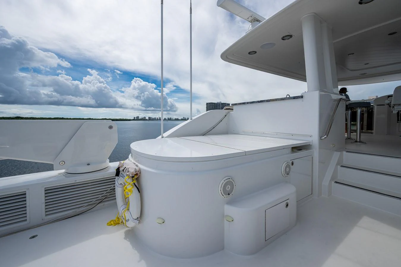 The flybridge offers a spacious and open area with a sleek design, perfect for enjoying panoramic views. aboard LILA CUY Yacht for Sale