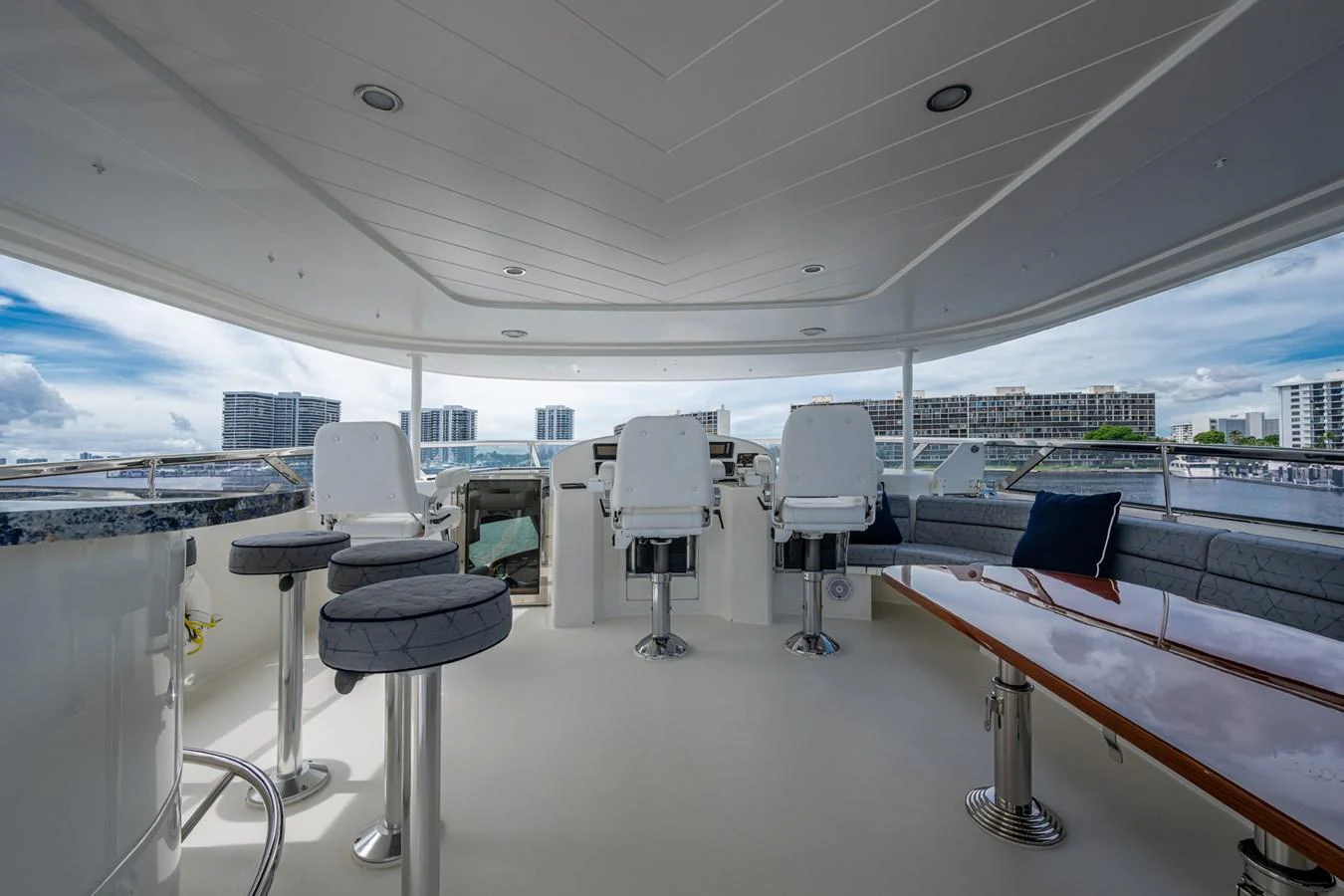 The flybridge offers a spacious and modern seating area with panoramic views. aboard LILA CUY Yacht for Sale