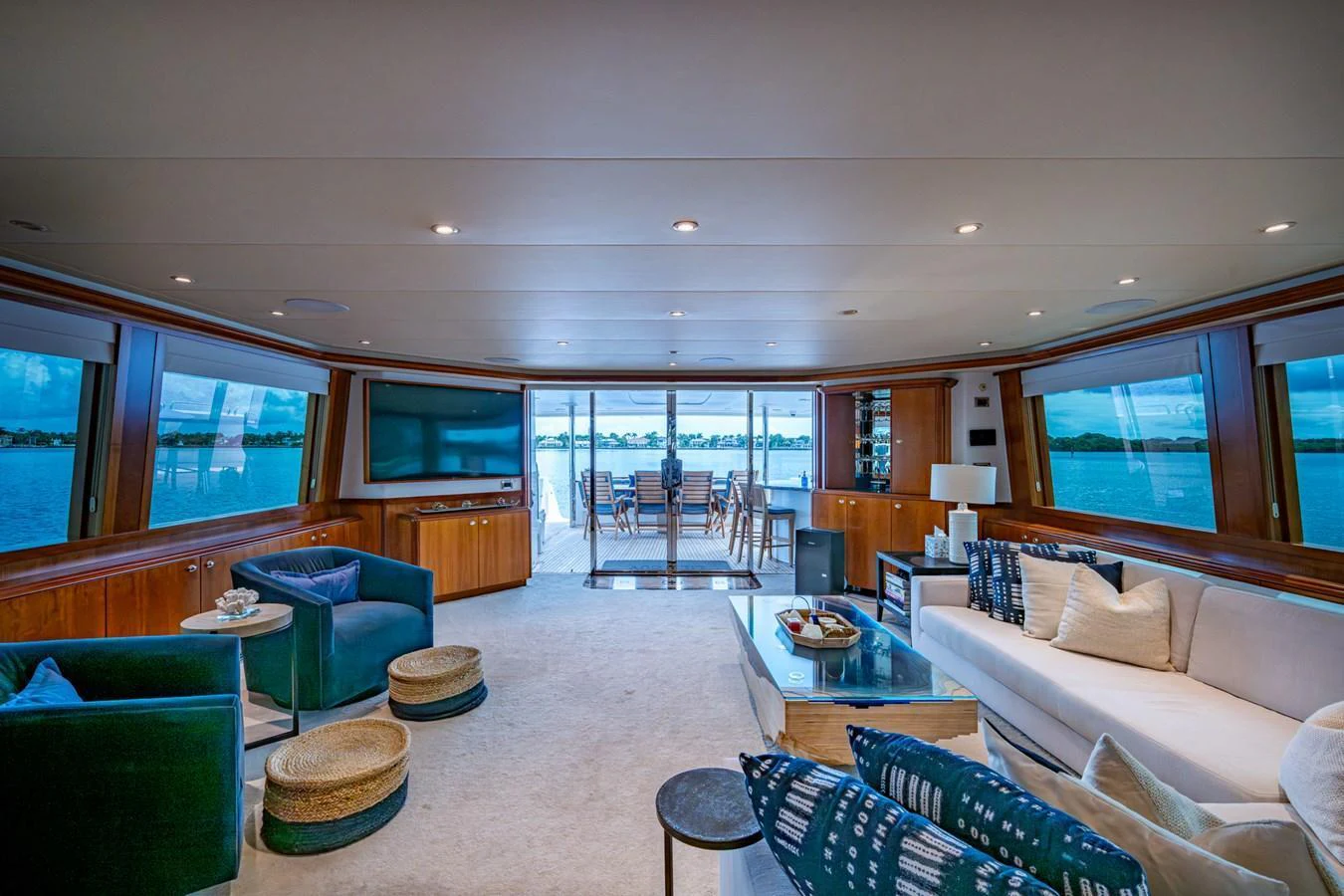 The spacious salon offers panoramic views and luxurious seating arrangements. aboard LILA CUY Yacht for Sale