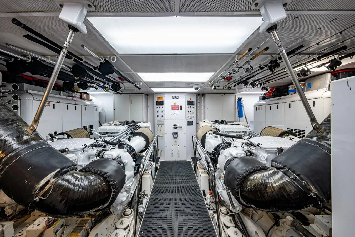 The yacht's engine room is meticulously organized, showcasing powerful machinery and advanced engineering. aboard LILA CUY Yacht for Sale