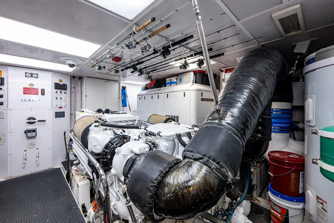 The image showcases the well-organized engine room of the yacht, highlighting its mechanical systems and equipment. aboard LILA CUY Yacht for Sale