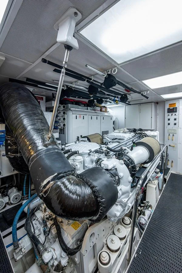 The yacht's engine room showcases powerful machinery and well-organized systems. aboard LILA CUY Yacht for Sale