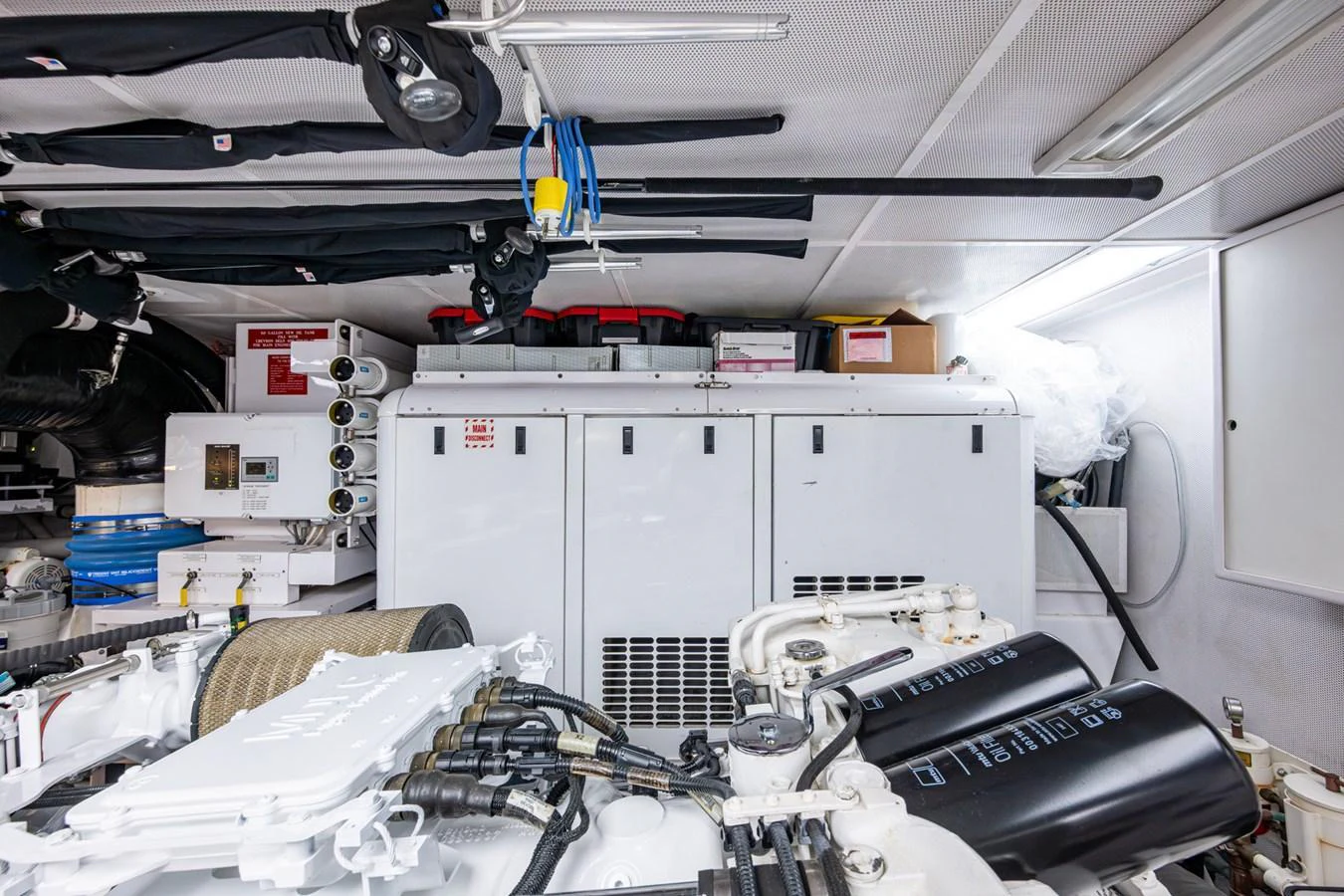 The image showcases the well-organized and clean engine room of the yacht, highlighting its advanced mechanical systems. aboard LILA CUY Yacht for Sale