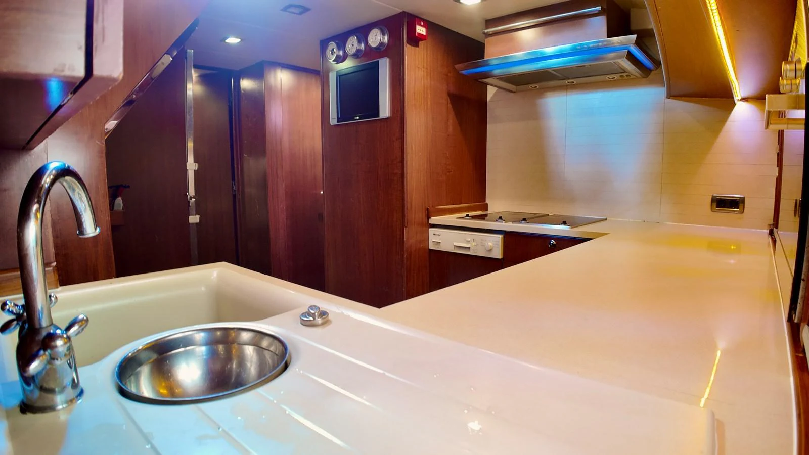 The yacht's galley features modern appliances and ample counter space, perfect for gourmet meal preparation. aboard PORTOBELLO Yacht for Sale