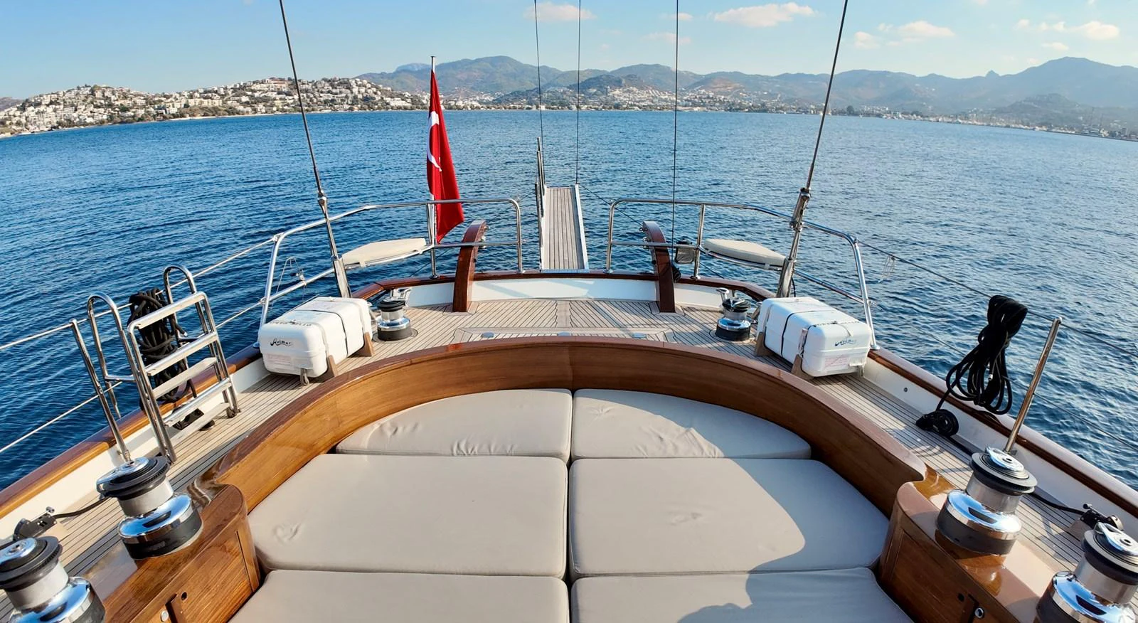 The yacht's aft deck offers a spacious and inviting lounging area with stunning views of the surrounding waters. aboard PORTOBELLO Yacht for Sale