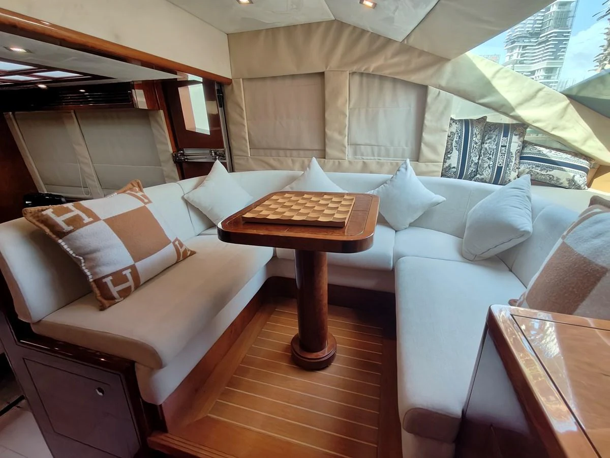 a room with a bed and a table aboard HERMAS Yacht for Sale