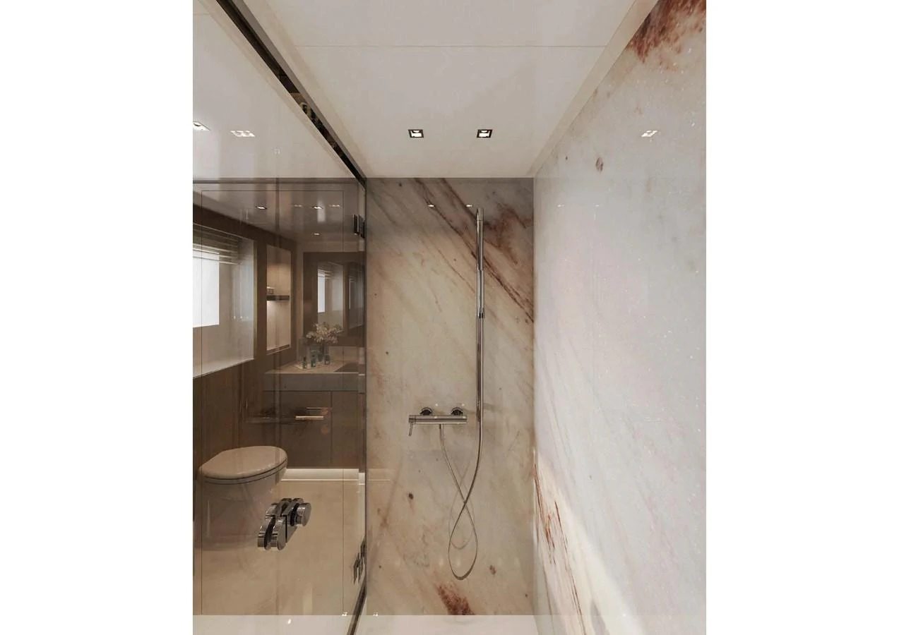 The yacht's bathroom features a sleek, modern design with a glass-enclosed shower and elegant marble walls. aboard MANGUSTA OCEANO 44, #8 Yacht for Sale