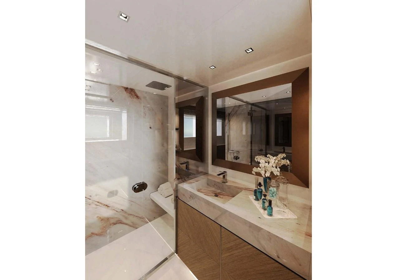 The yacht's bathroom features a luxurious marble finish with modern fixtures and ample lighting. aboard MANGUSTA OCEANO 44, #8 Yacht for Sale