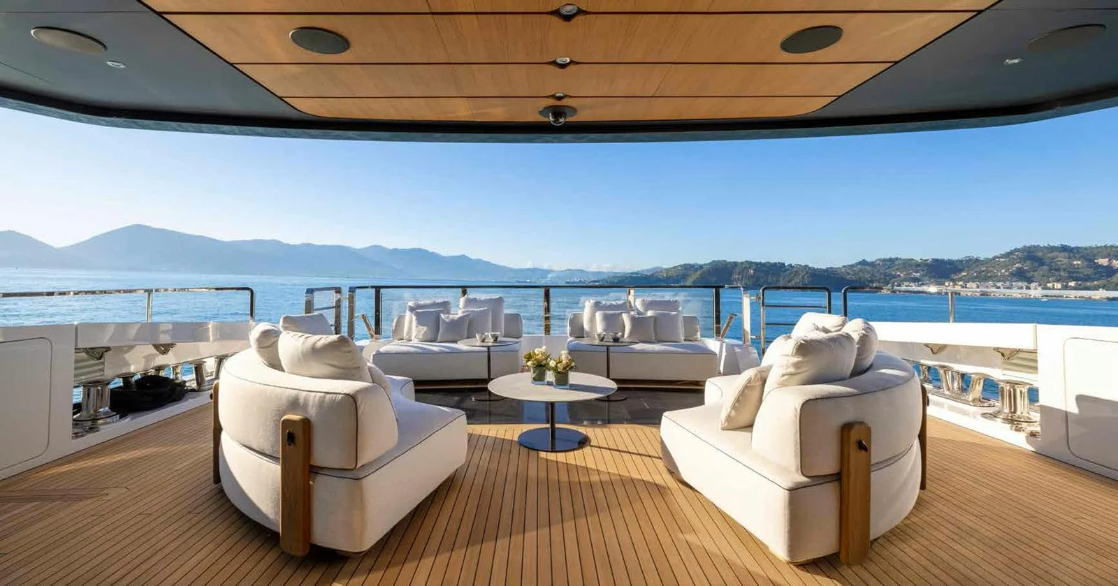 The aft deck offers a luxurious outdoor seating area with stunning views of the surrounding waters. aboard MANGUSTA OCEANO 44, #8 Yacht for Sale