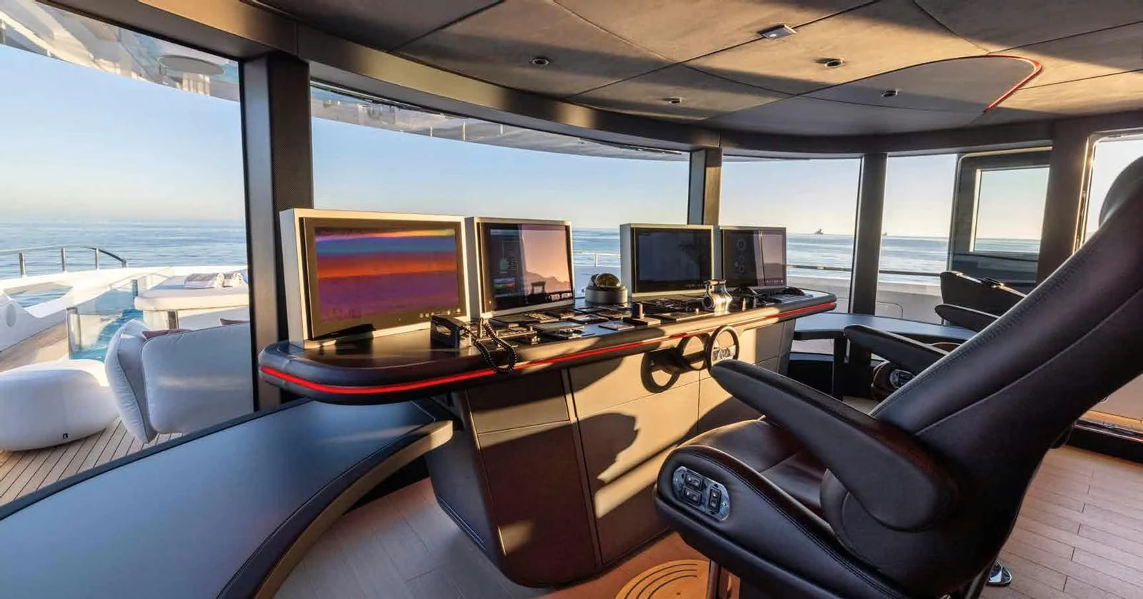 The helm station offers a sophisticated and modern control area with panoramic views. aboard MANGUSTA OCEANO 44, #8 Yacht for Sale