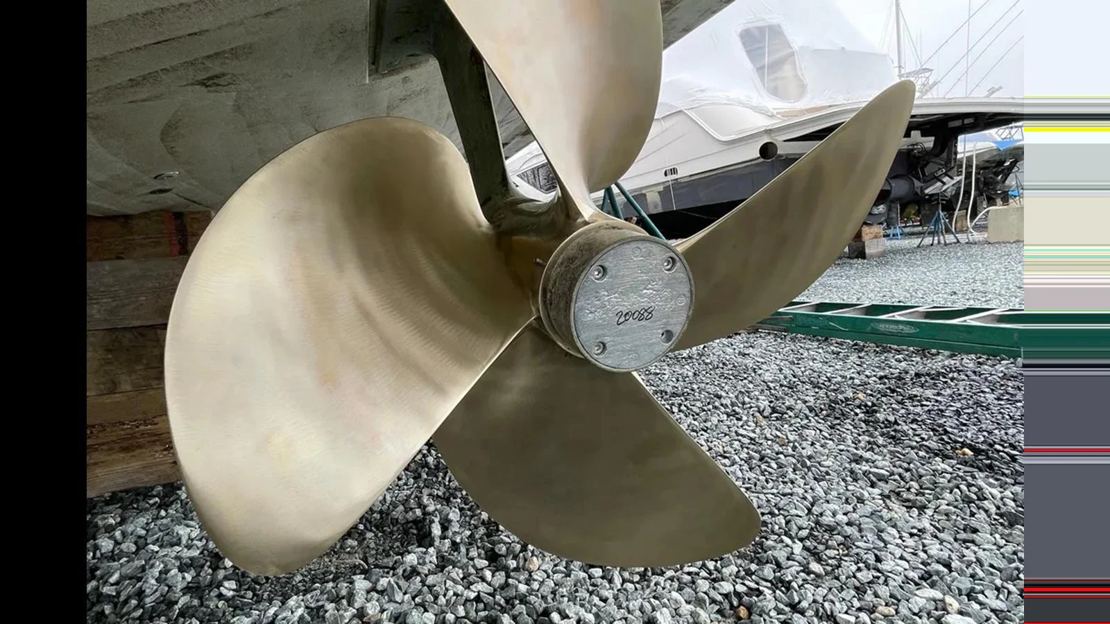 A close-up view of a yacht's propeller showcasing its polished blades. aboard 2007 AZIMUT 68S Yacht for Sale