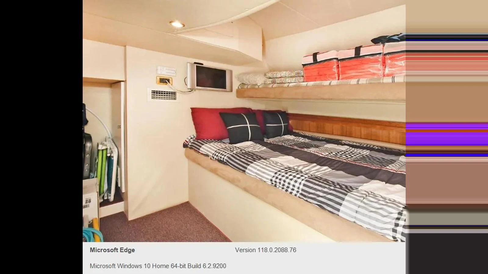 The guest cabin features cozy bedding and ample storage space for a comfortable stay. aboard 2005 AZIMUT 68E Yacht for Sale