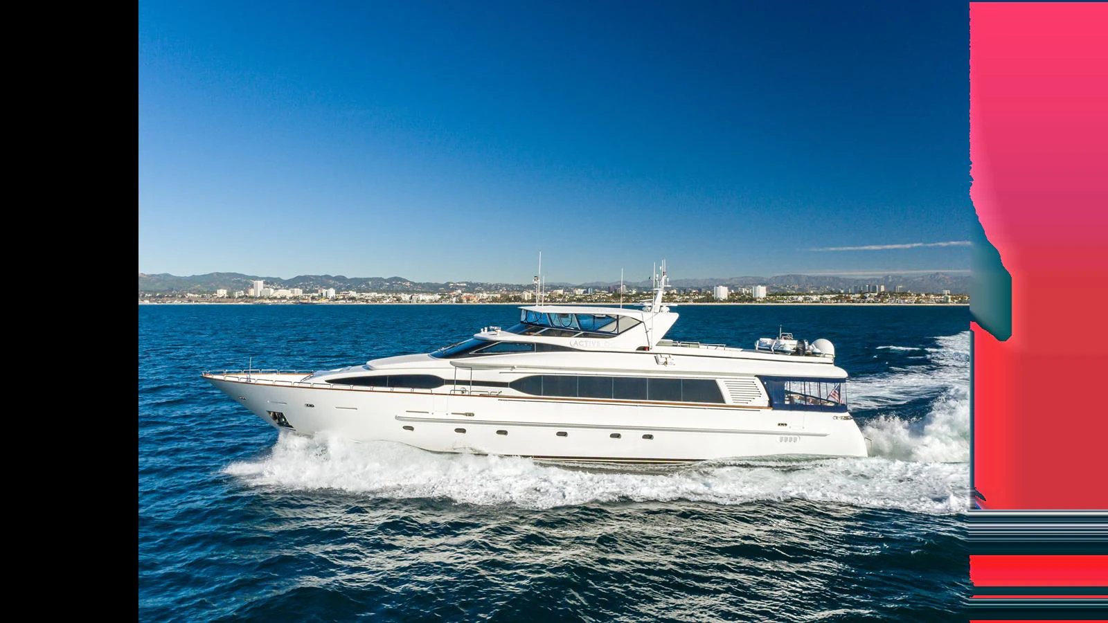 A sleek and elegant yacht cruises through the open water on a clear day. aboard ACTIVE OCTO Yacht for Sale
