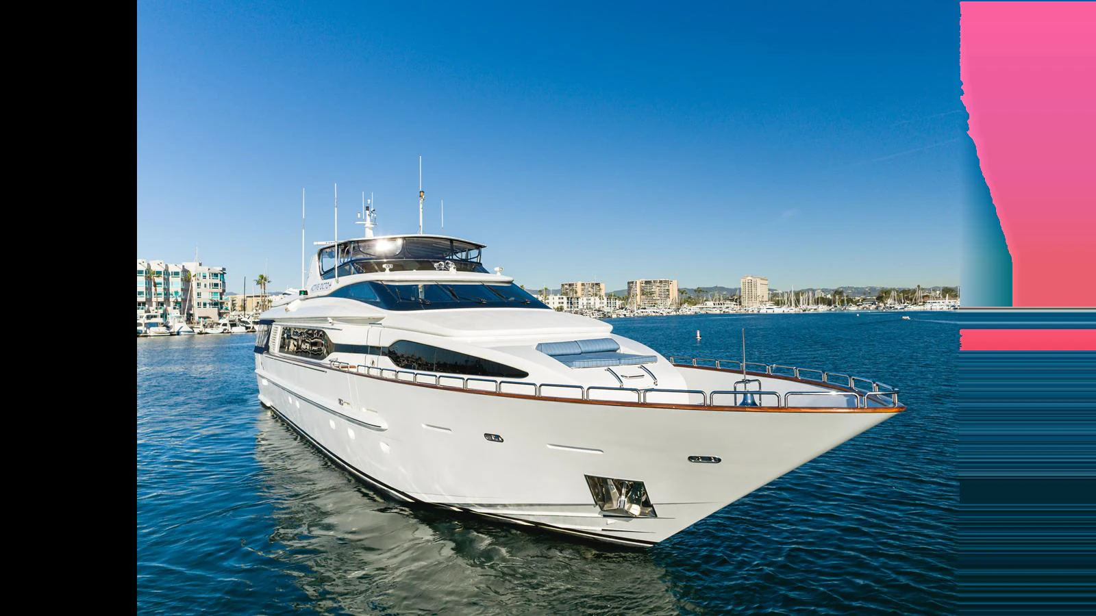 A sleek and modern yacht glides gracefully on the water under a clear blue sky. aboard ACTIVE OCTO Yacht for Sale